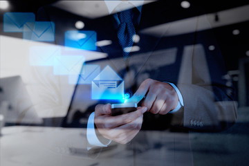 businessman hand use smart phone computer