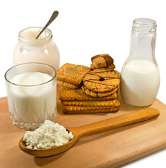 image of dairy products on a wooden board