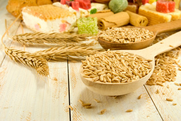 various sweets and wheat on the table
