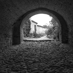 Monforte d'Alba (Cuneo); old alley. Black and white photo