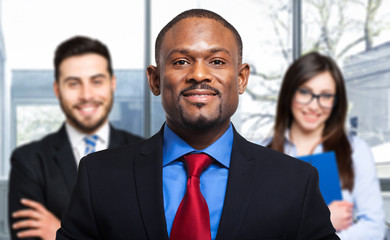 Happy smiling multi ethnic business team in office