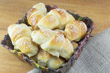 Homemade pastry with sesame in decorated bowl
