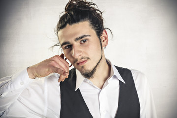 Young man showing calling sign