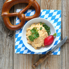 Fresh german Pretzel with Obatzda cheese