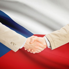 Businessmen handshake with flag on background - Czech Republic