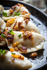 Dumplings with meat, onion and bacon.