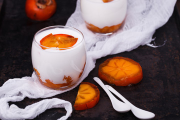 The homemade yogurt in a glass of persimmon