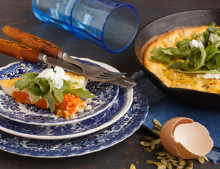 Frittata with pumpkin in a pan.selective focus