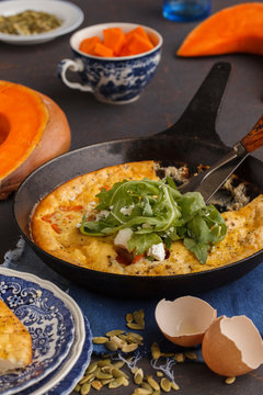 Frittata with pumpkin in a pan.selective focus
