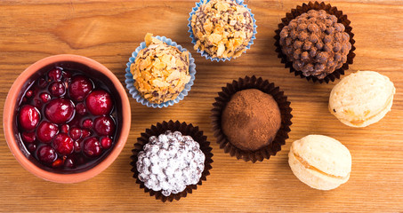 chocolate candies on the wooden plate