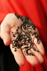 Image of henna on female hand, closeup