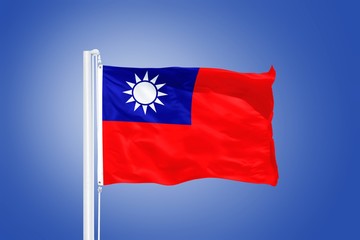 Naklejka na ściany i meble Flag of Taiwan flying against a blue sky