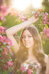 Young spring fashion woman in spring garden Springtime Summertim