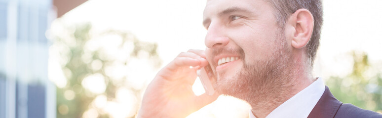Handsome businessman on the phone