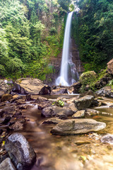Vibrant colors in the water at gitgit waterfall - Bali, Indonesi