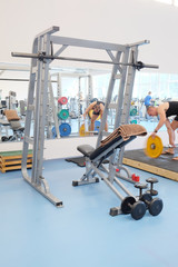 Fototapeta na wymiar Interior of a fitness hall with fitness equipment