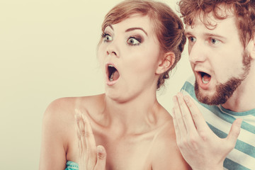  wide eyed couple surprised expression open mouth