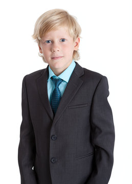 Young businessman portrait in suit and tie, isolated on white background