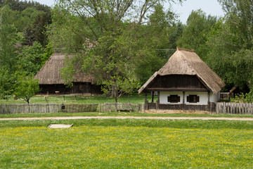 Fototapeta na wymiar Old village houses with a straw roof in Transdanubia, Hungary