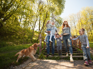 Fototapeta premium Riendly, cheerful family having a picnic.