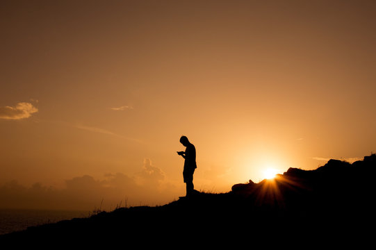 Silhouette of man at mountion