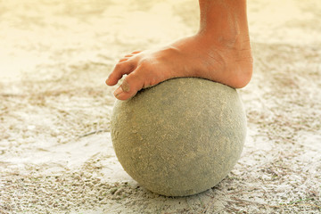Human foot stepped on the balll
