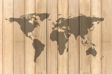 World map on wooden texture background