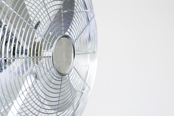 air cooler chrome Metal fan on a white background with spinning