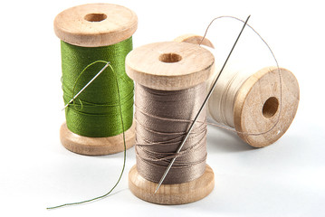 Isolated spools of thread