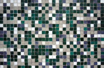 Mosaic made of green shade and white tiles