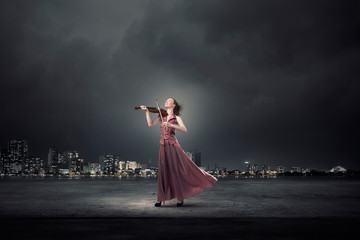 Fototapeta premium Woman play violin