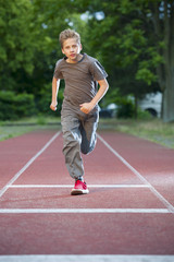 Fototapeta premium boy trained 100 m run_2