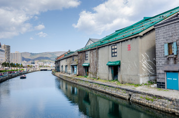 Otaru Canal was a central part of the city's busy port in the first half of the 20th century.Now ,the warehouses were transformed into museums, shops and restaurants.