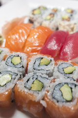 salmon and tuna sushi and california rolls