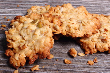 Oatmeal cookies on wooden background