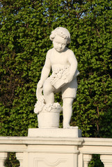 Fototapeta na wymiar Statue in the Belvedere Palace Gardens, Vienna, Austria