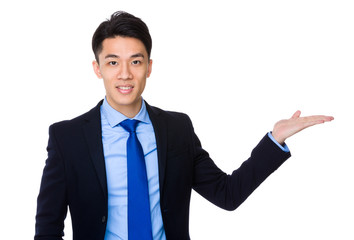 Asian businessman with open hand palm