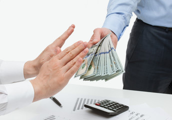 Businessman refusing money
