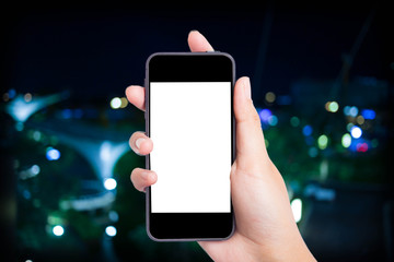 Taking a picture with a smart phone.