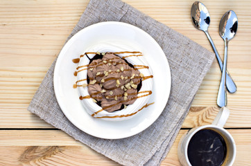 White meringues with brown chocolate stripes