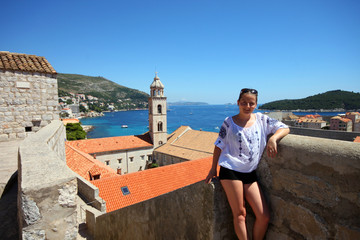 attractive woman posing on Dubrovnik walls