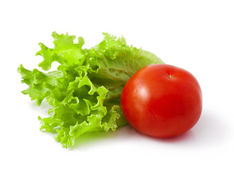 fresh tomatoes with green lettuce isolated on white background