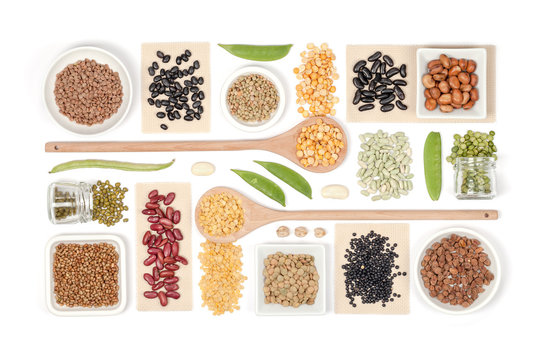 various legumes on white background top view