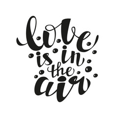 Hand lettering calligraphic typography poster.Romantic quote 'Love is in the air'.For greeting cards, postcards, posters, t-shirts and other decorations.Vector illustration