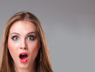 Close-up portrait of surprised beautiful girl