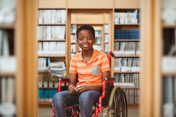 Portrait of happy boy on wheelchair