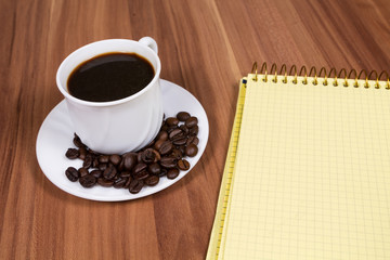 Cup of coffee,notebook