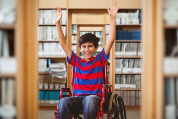 Composite image of boy in wheelchair in school corridor