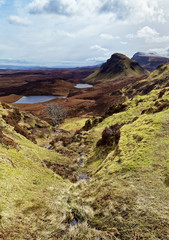 Scenic view of Quiraing mountains with blue sky, Isle of Skye