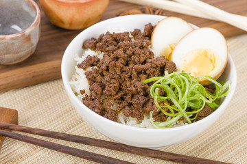 Lu Rou Fan (Taiwanese Braised Pork Rice Bowl) - Ground pork marinated and boiled in soy sauce served on top of steamed rice.
